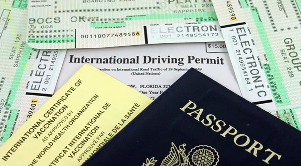 1. 📖 Passport and Travel Documents: